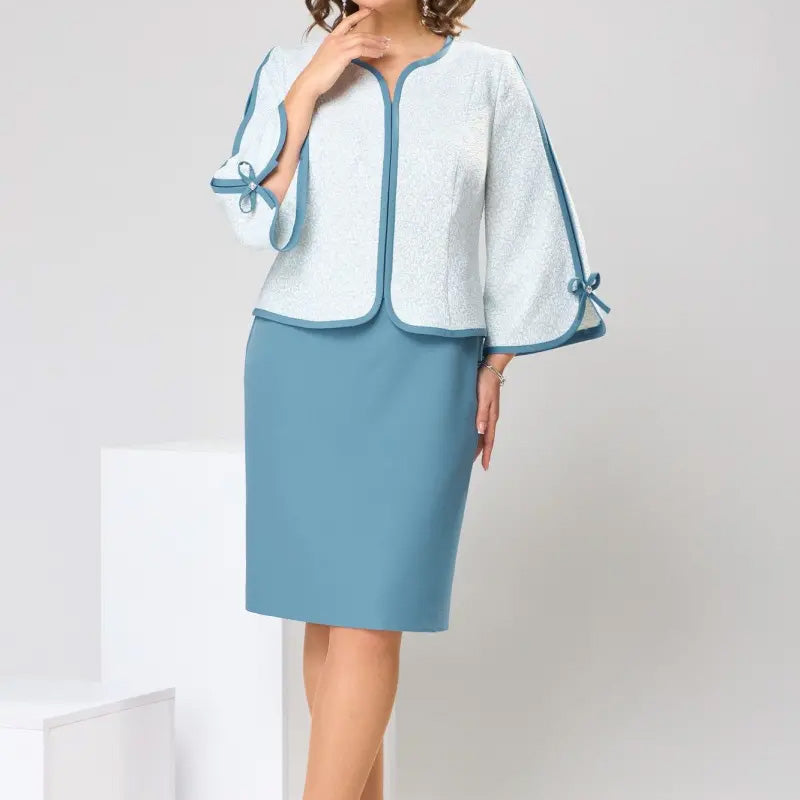 Elegancki top z kokardą i spódnica z rozcięciem na plecach