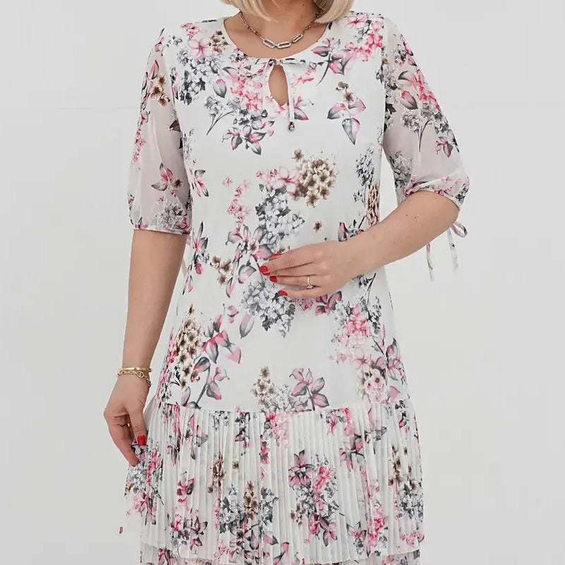 Elegancka damska sukienka plisowana z krótkim rękawem i długą spódnicą