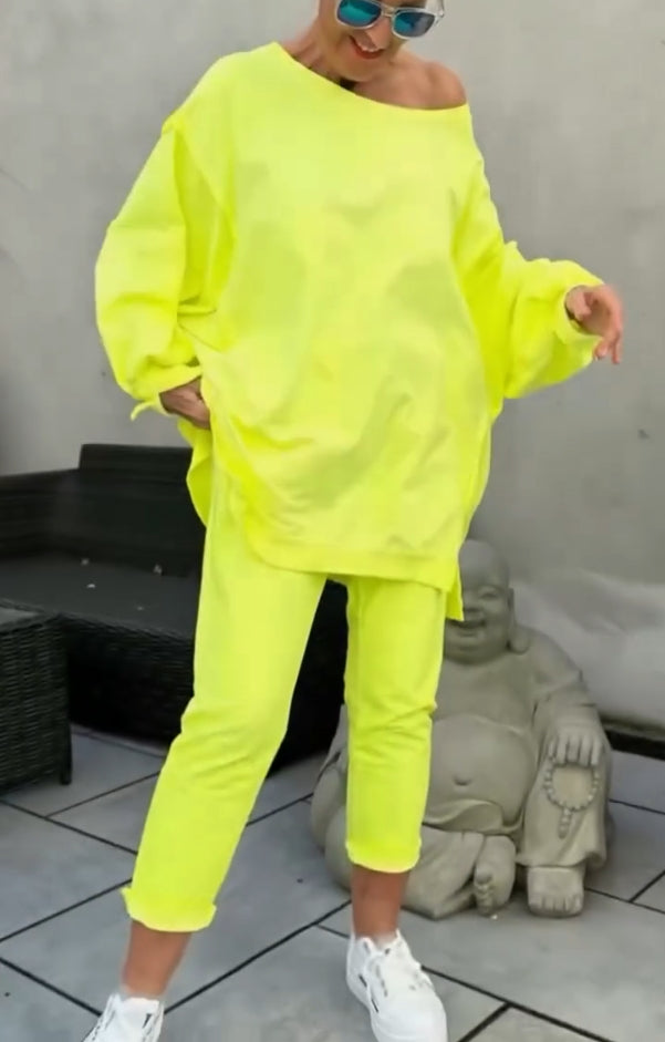 Letni damski okrągły dekolt rozcięcie jasny kolor casualowy garnitur